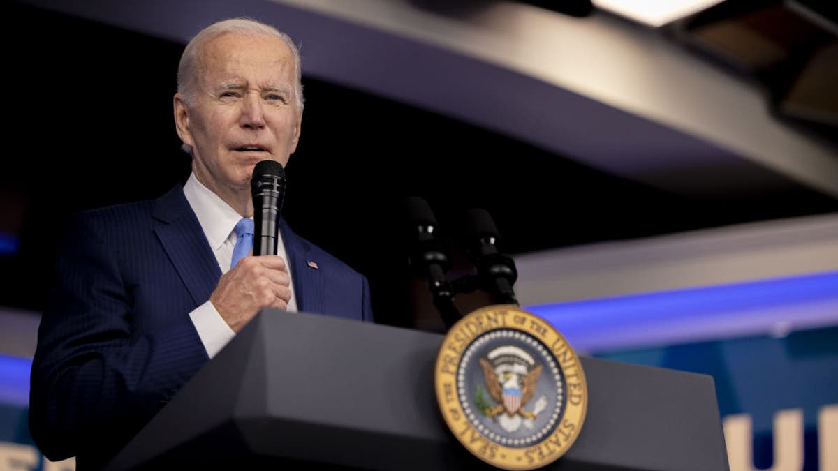 Joe Biden speaking at podium