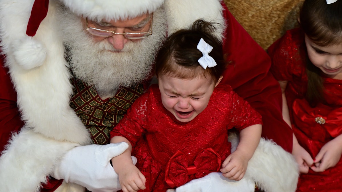 Santa crying child