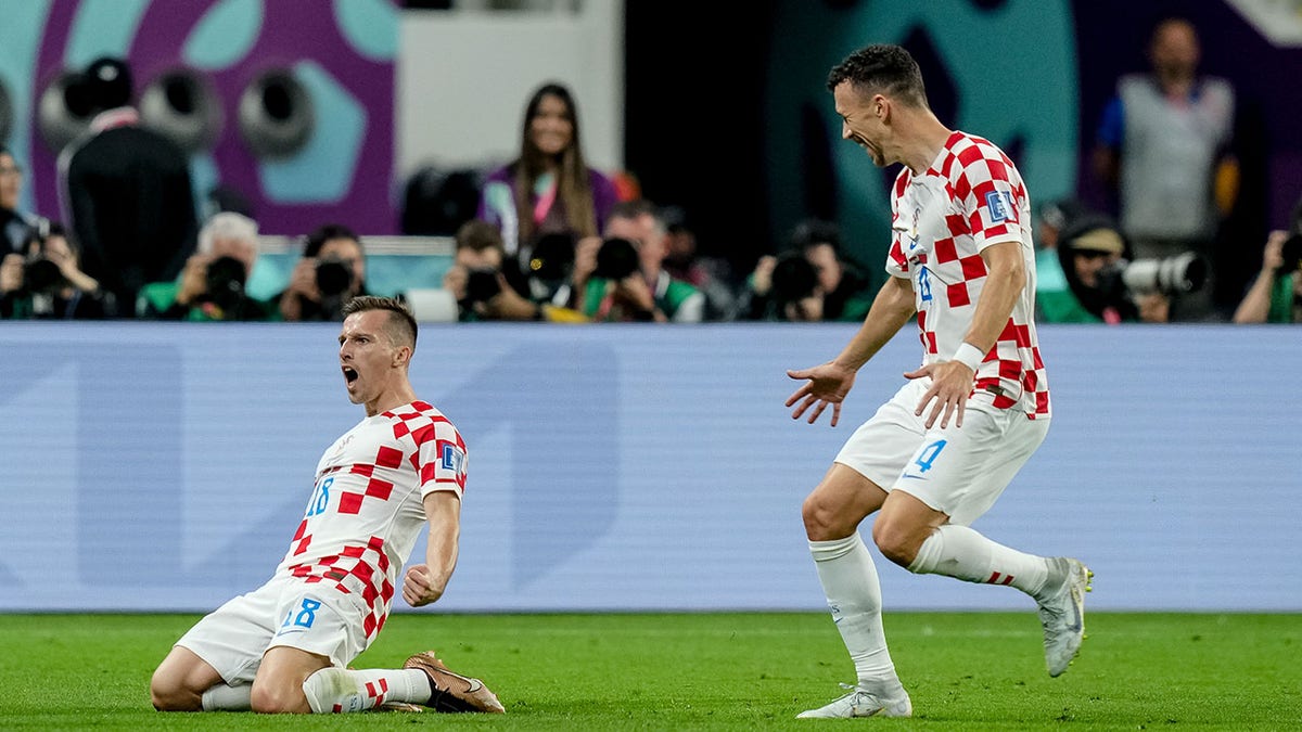 Mislav Orsic celebrates after scoring a goal