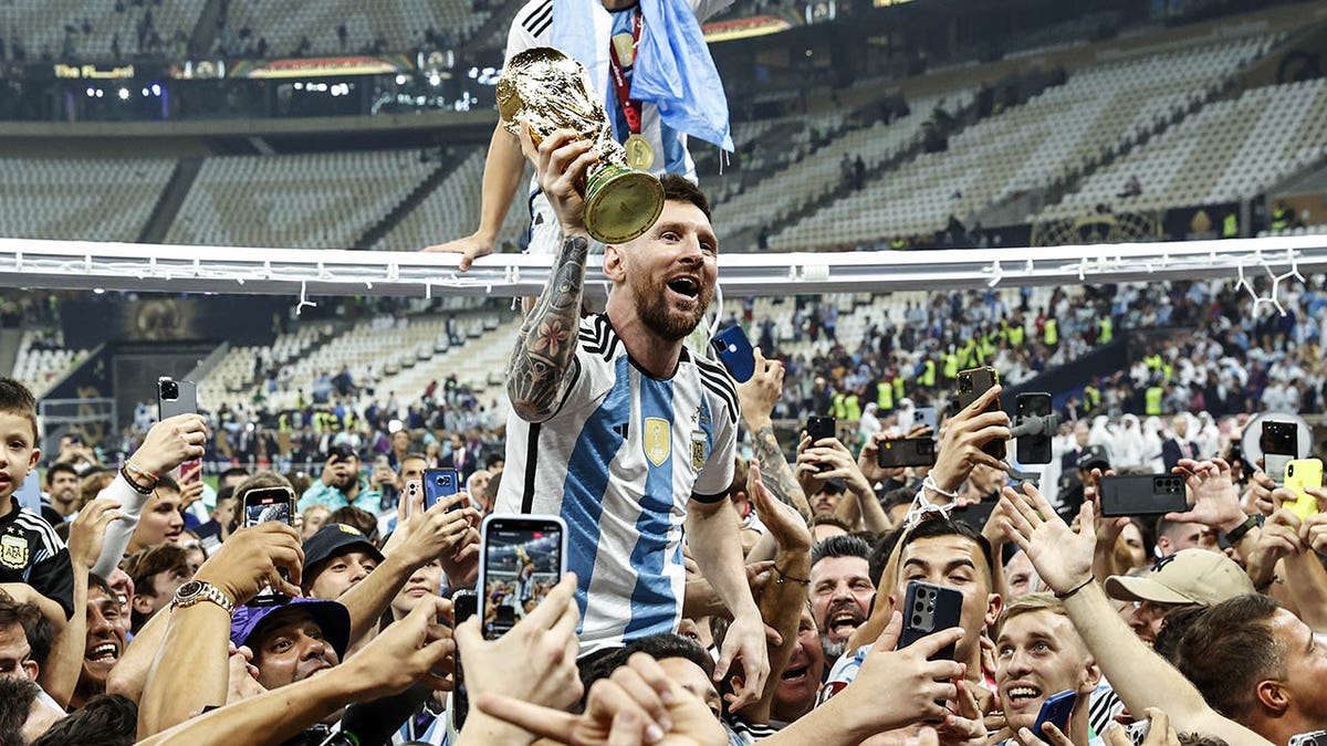 Lionel Messi celebrates winning the World Cup