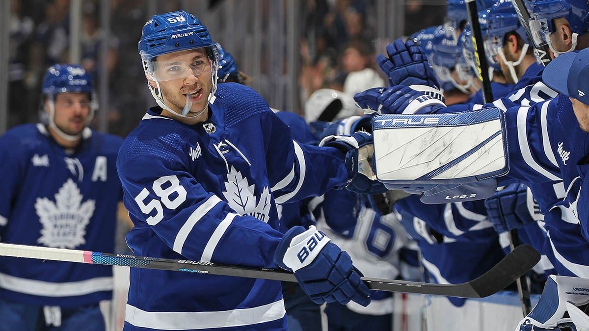 Leafs winger Michael Bunting celebrates scoring a goal against the Lightning