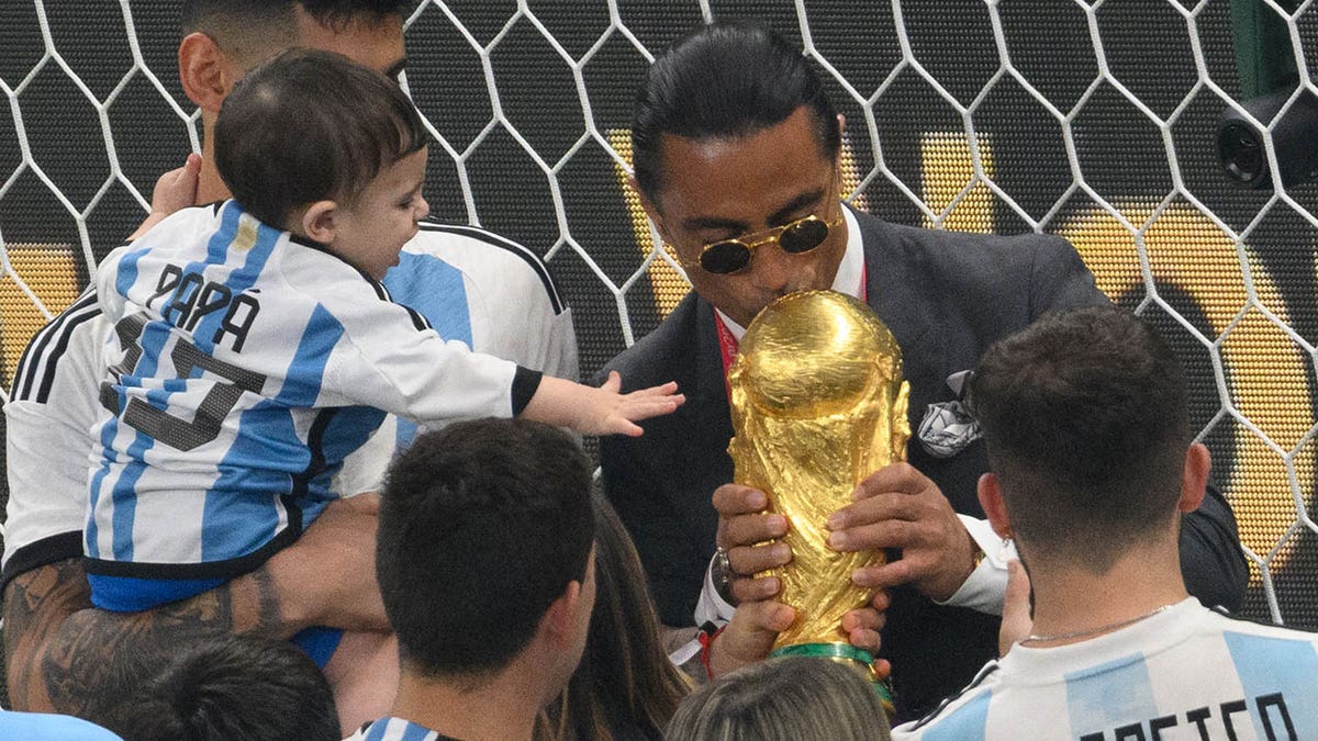 Salt Bae kisses the World Cup trophy