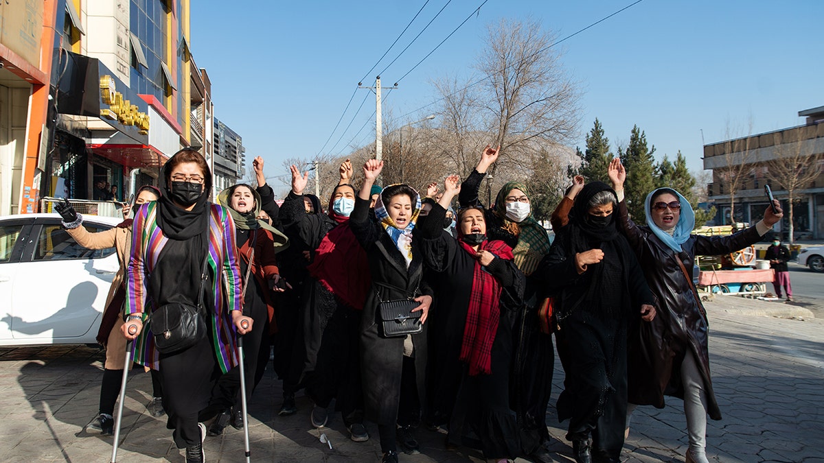 A photo of several women in a crowd