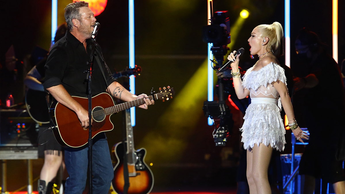 Blake and Gwen on stage together