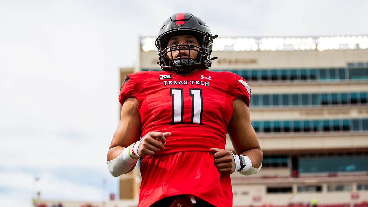 Texas Tech's Dimitri Moore warms up before a game