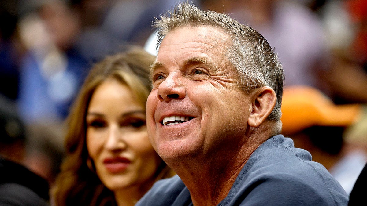 Sean Payton watches an NBA game in October
