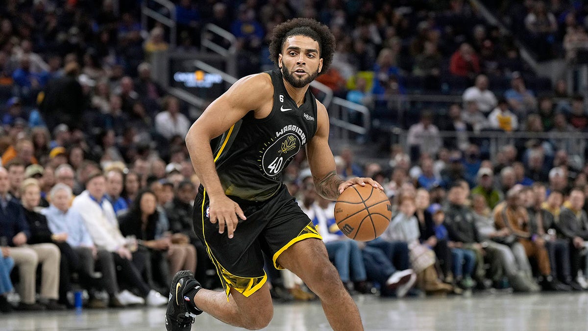 Anthony Lamb drives towards the net during an NBA game