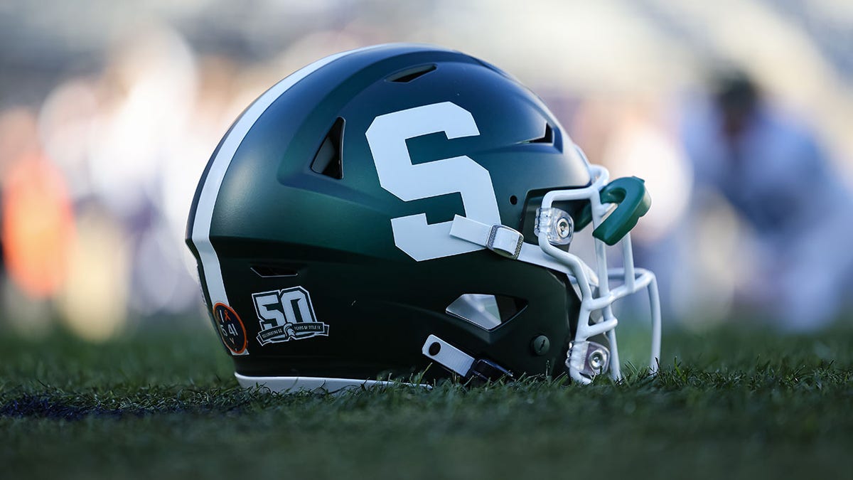 A Michigan State Spartans helmet on the field