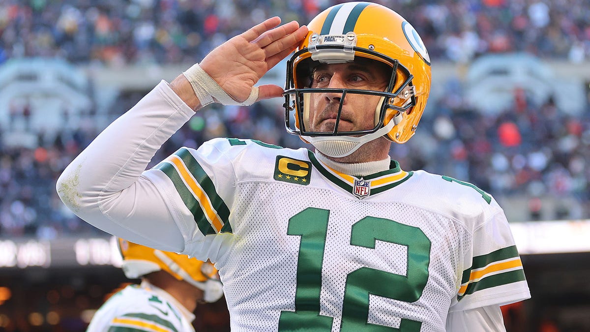 Aaron Rodgers celebrates after a touchdown
