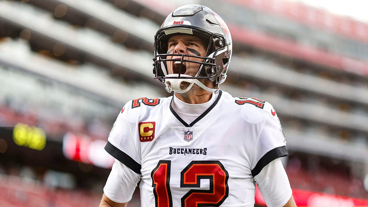 Tom Brady reacts before an NFL game