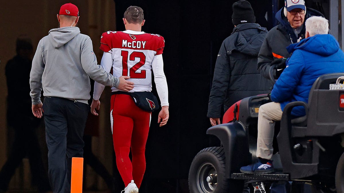 Colt McCoy exits the field against Denver