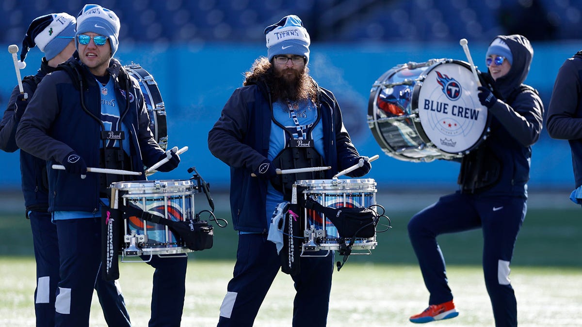 Blue Crew Drumline warms up before the Titans-Texans game