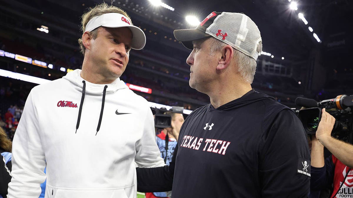 Joey McGuire and Lane Kiffin talk after the Texas Bowl game