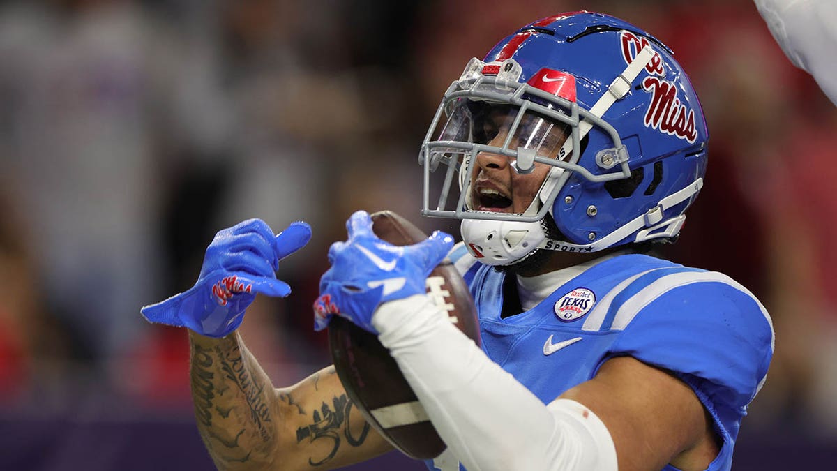 Jordan Watkins celebrates his reception