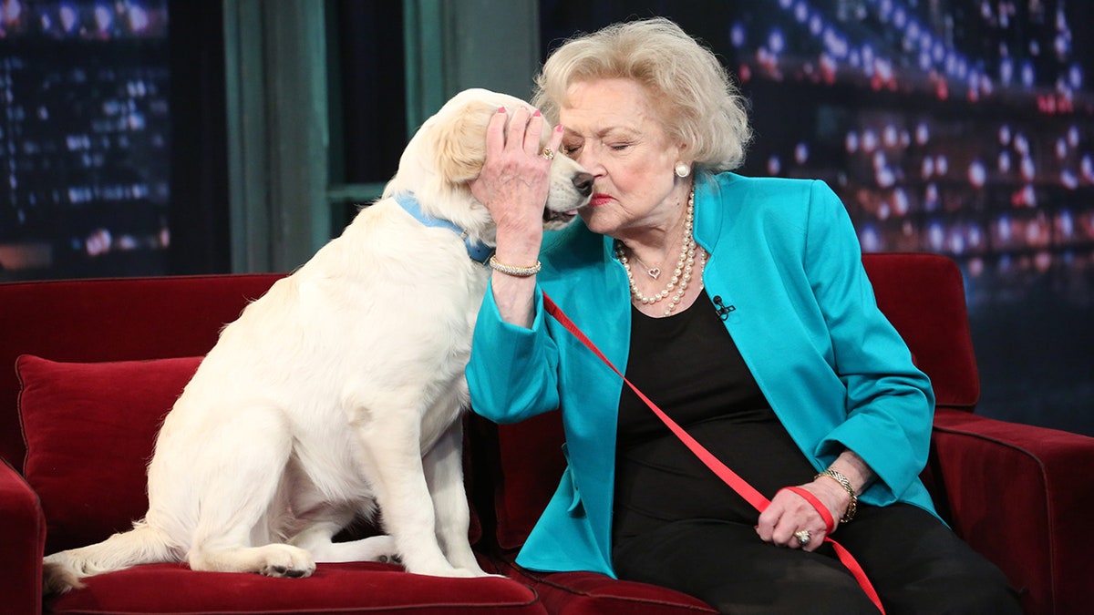 Betty White with a dog