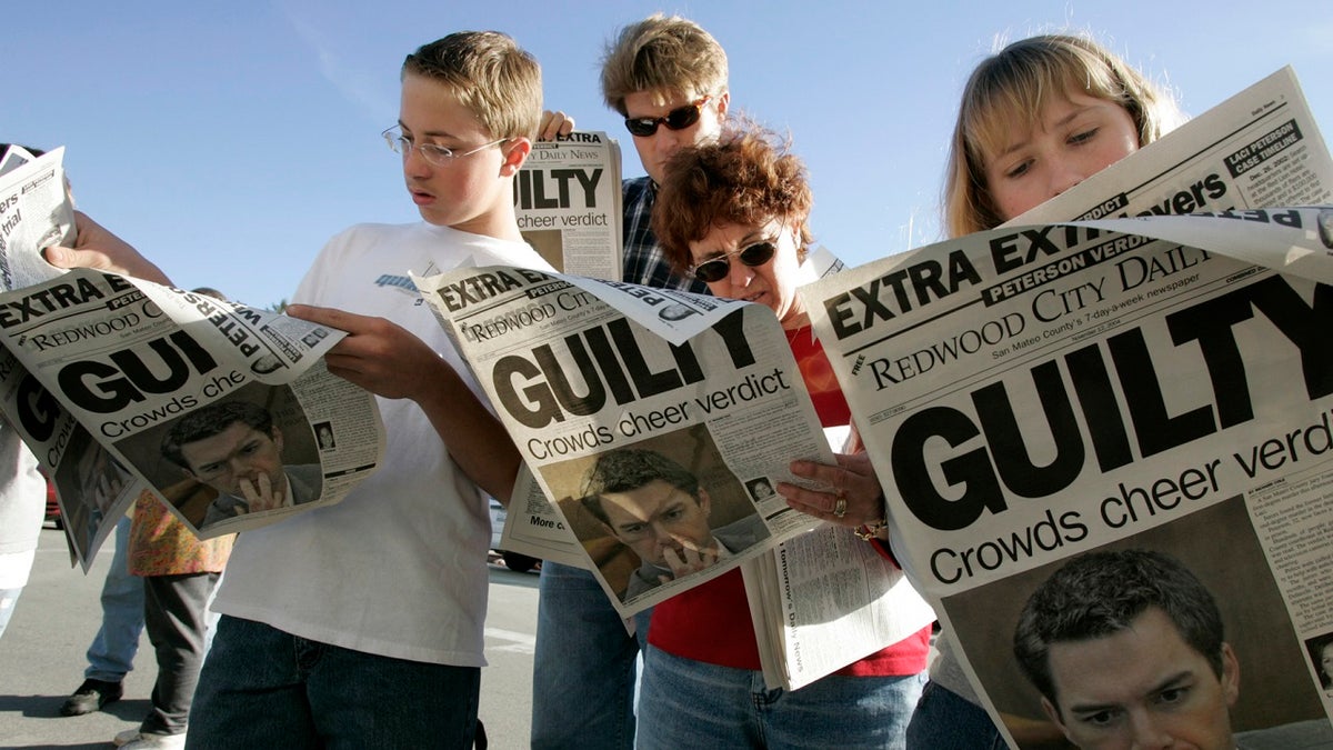 People reading newspapers with "guilty" Peterson verdict on front page