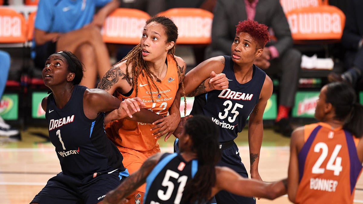 Brittney Griner and Angel McCoughtry during a WNBA game