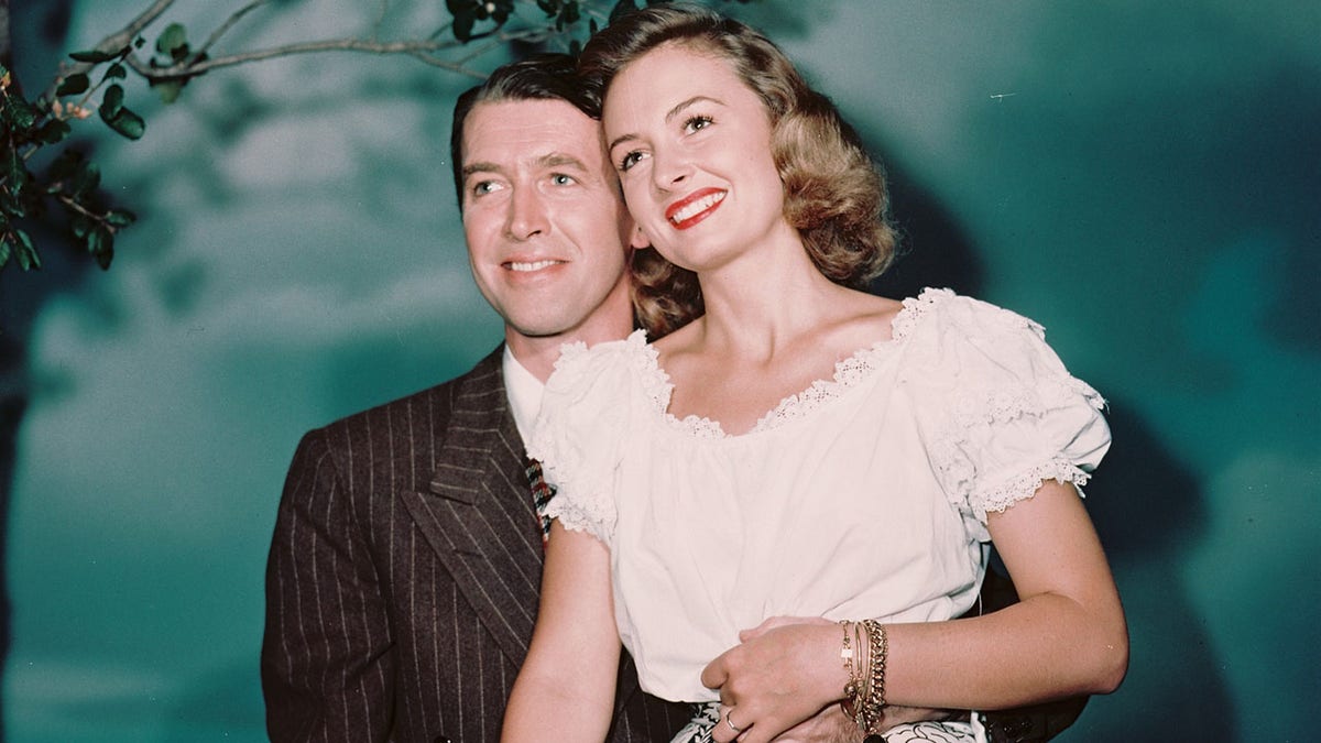 James Stewart and Donna Reed smiling