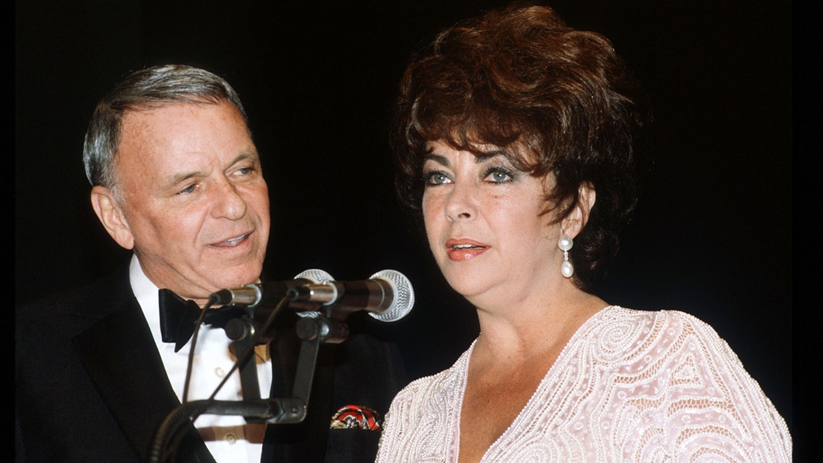 Elizabeth Taylor and Frank Sinatra speaking with the public