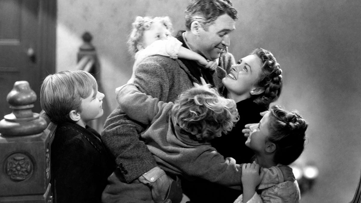 Donna Reed embracing Jimmy Stewart in It's a Wonderful Life