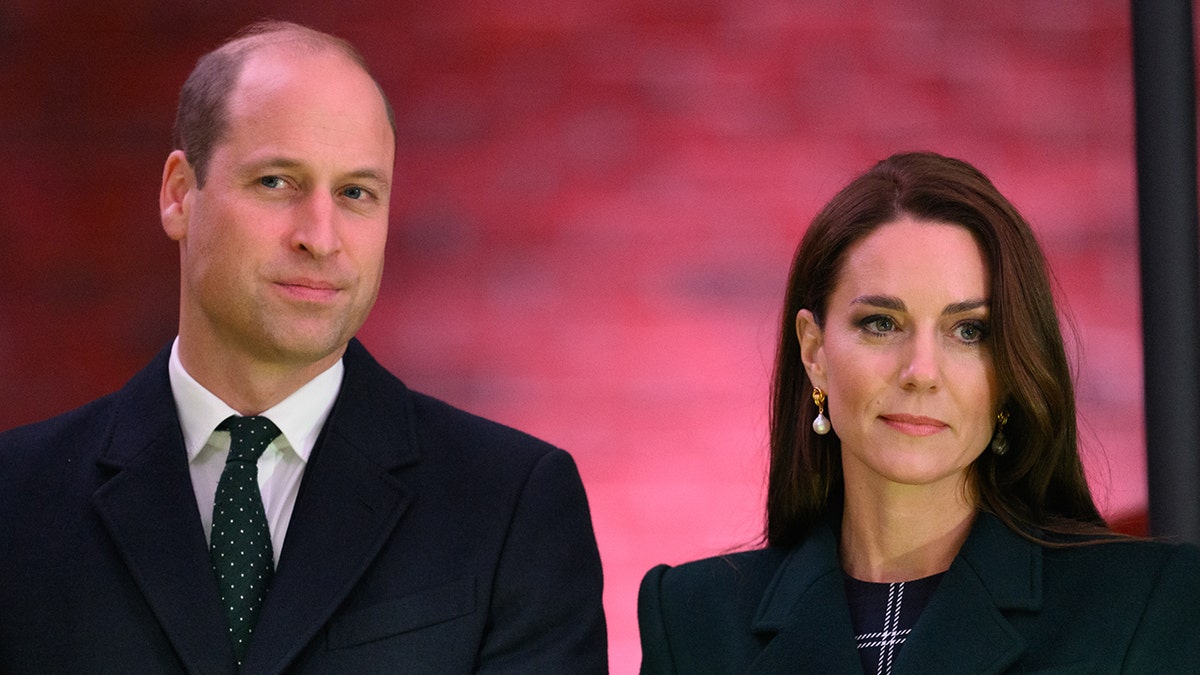 Prince William and Kate Middleton looking serious in Boston