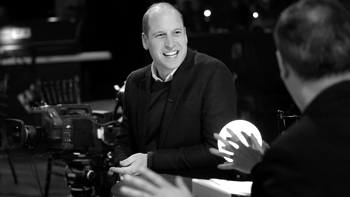 Prince William smiling during rehearsals