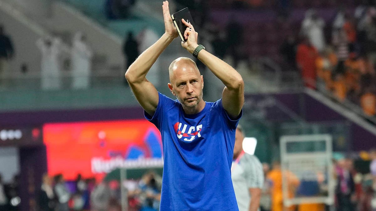 Gregg Berhalter walks off the field