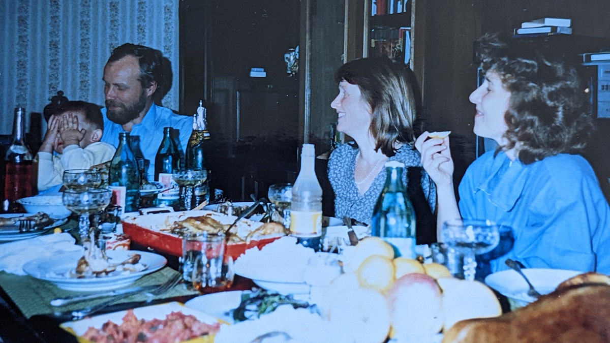 Vladimir Pokhilko having dinner with his family.