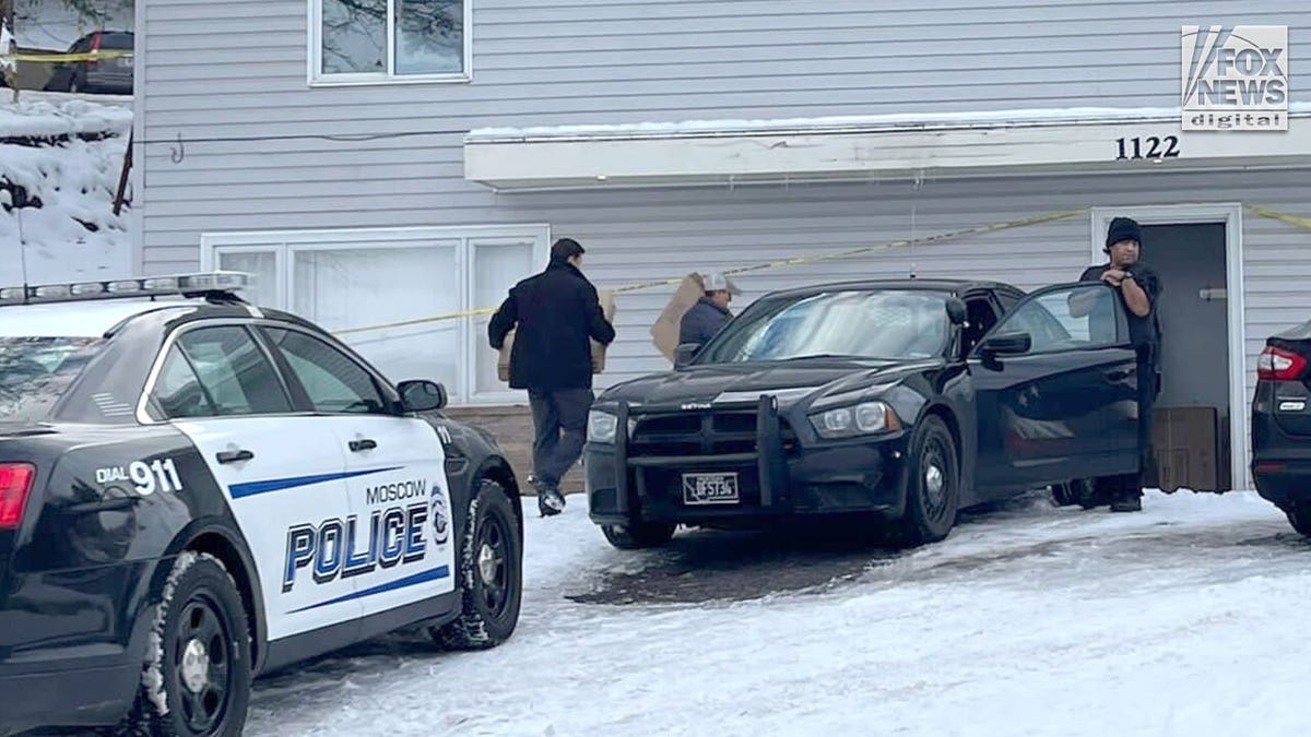 Patrol car parked out front of the home where four University of Idaho students were killed