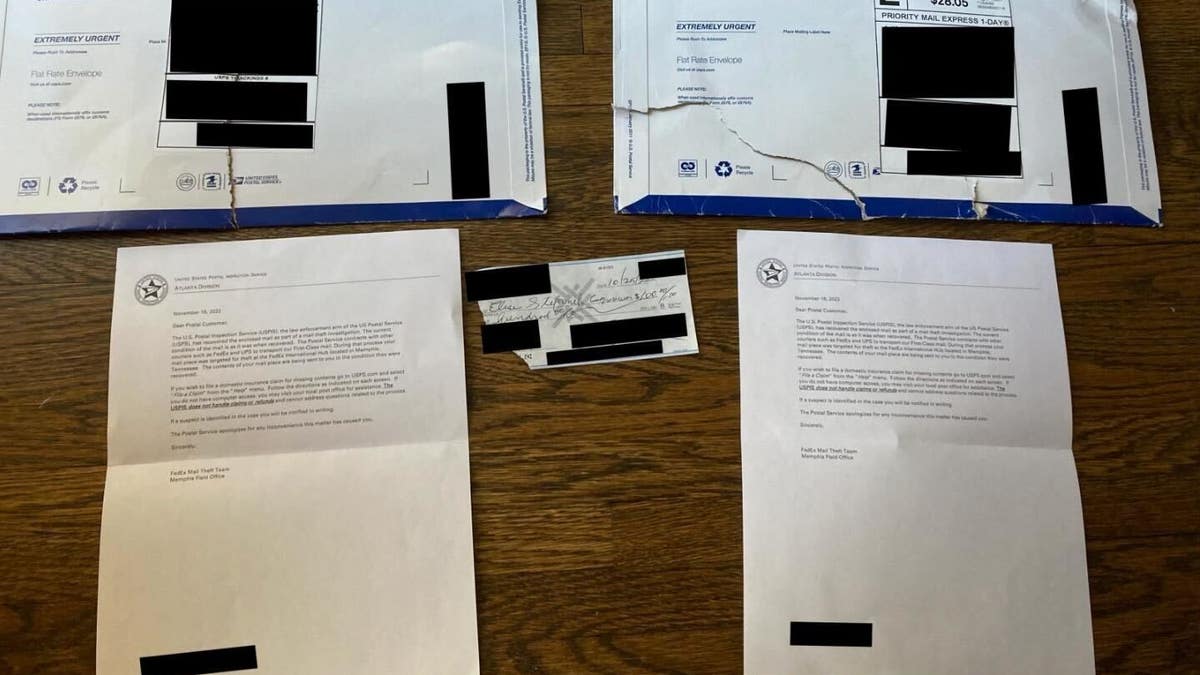 Photos of ripped packages containing donor checks allegedly stolen by U.S. Postal Service workers.
