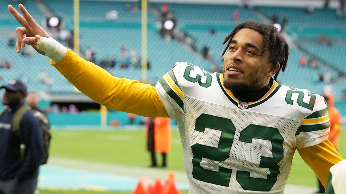 Jaire Alexander of the Packers walks off the field at Hard Rock Stadium