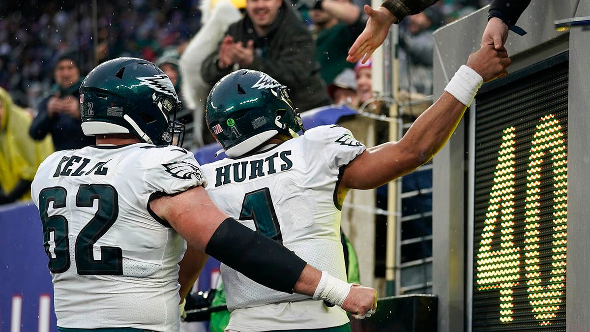 Jalen Hurts and Jason Kelce