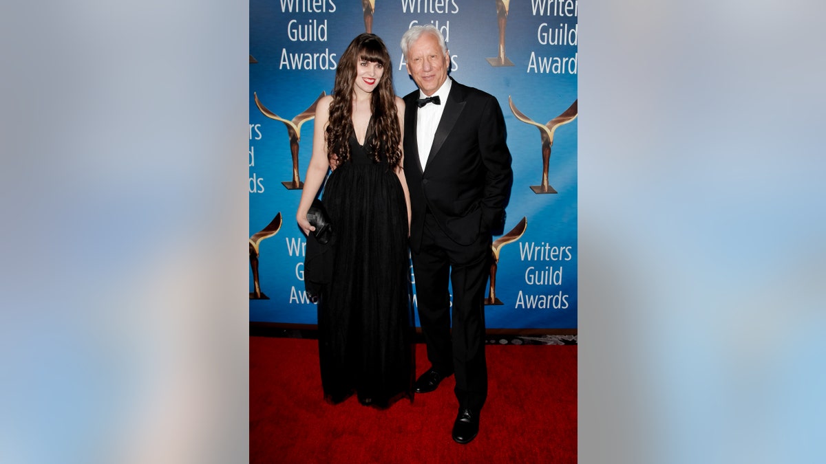 James Woods and Sara Miller wear black tie attire on red carpet
