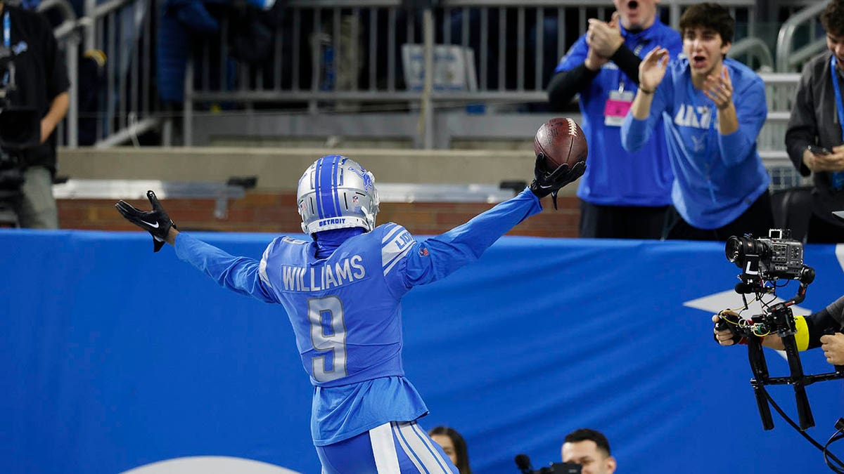 Jameson Williams celebrates a TD