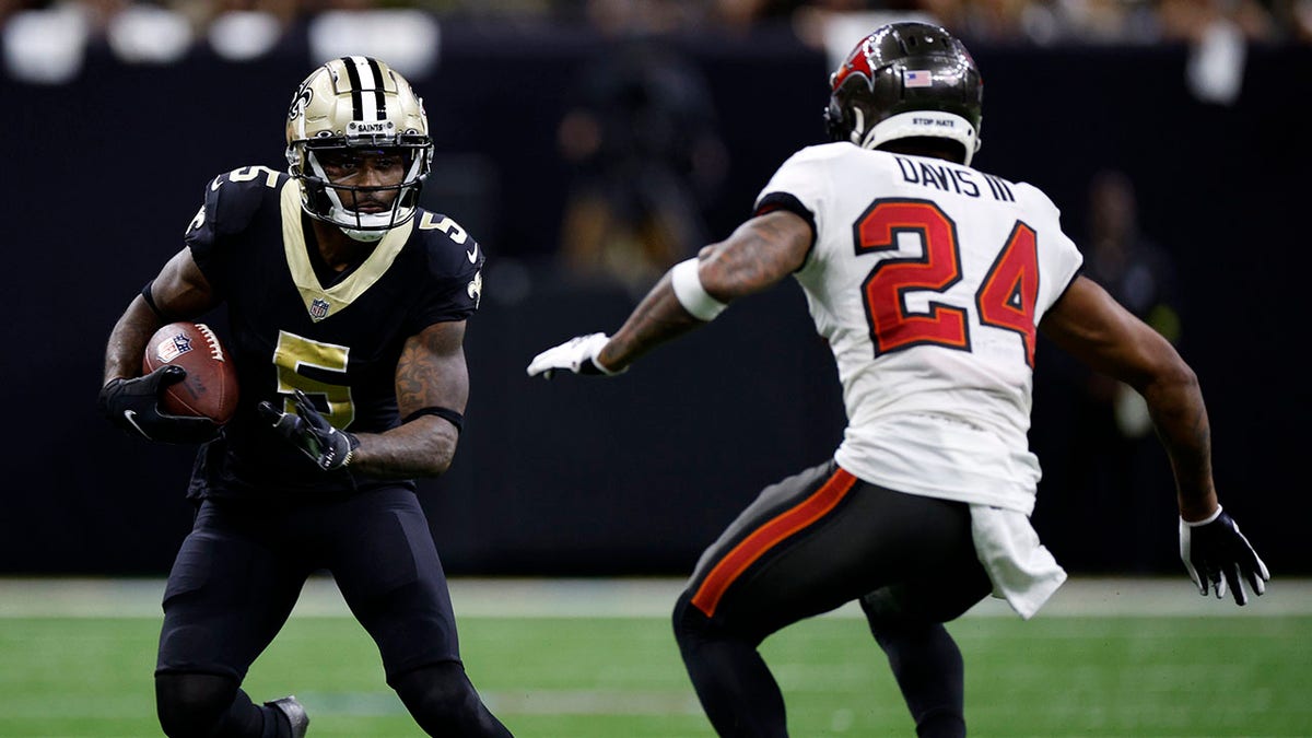 Saints wide receiver Jarvis Landry runs with the football