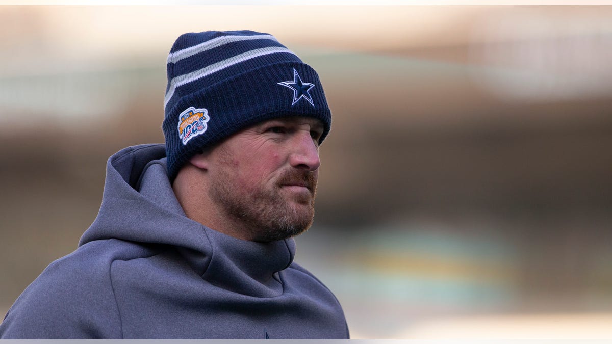 Jason Witten looks on field