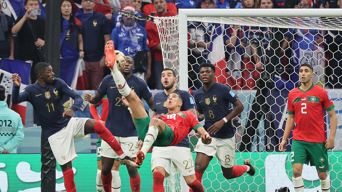Morocco defender attempts a shot during the World Cup