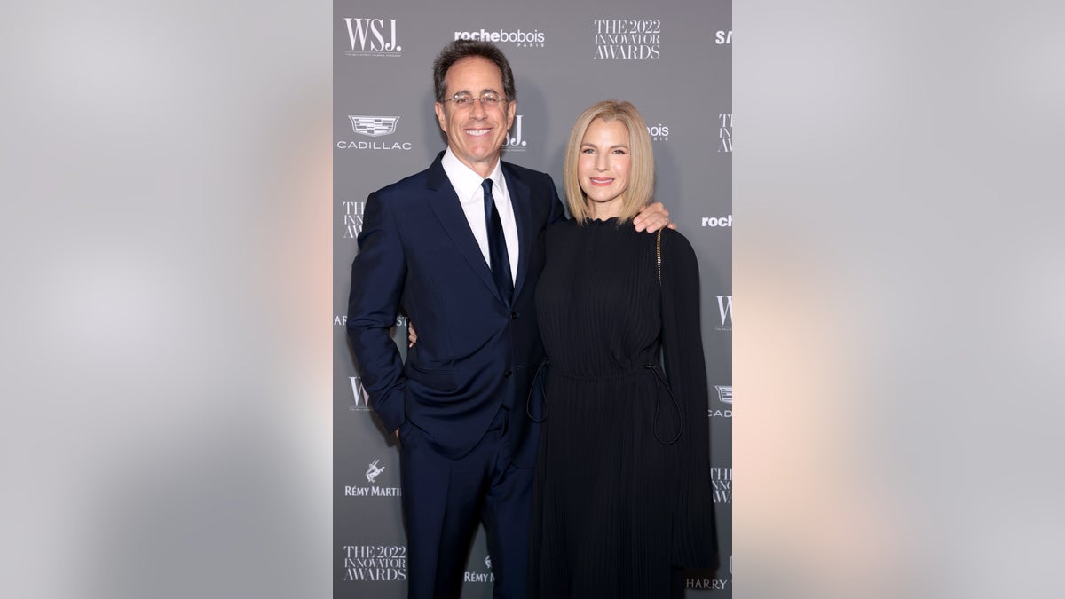 Jerry Seinfeld and his wife Jessica pose on the carpet at the WSJ. Magazine 2022 Innovator Awards