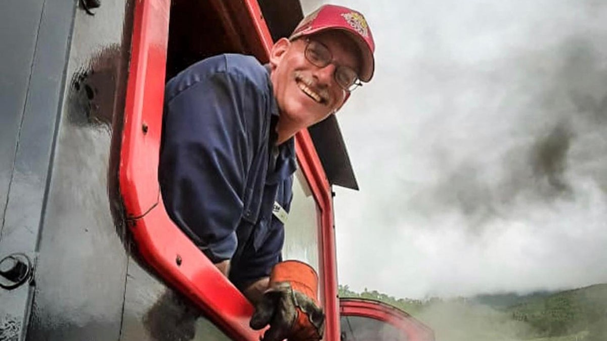 Joe Eggleston aboard a steam locomotive