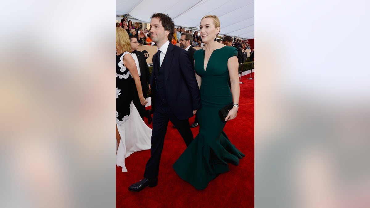 Kate Winslet and husband Ned Rocknroll walk the red carpet at 22nd Annual Screen Actors Guild Awards