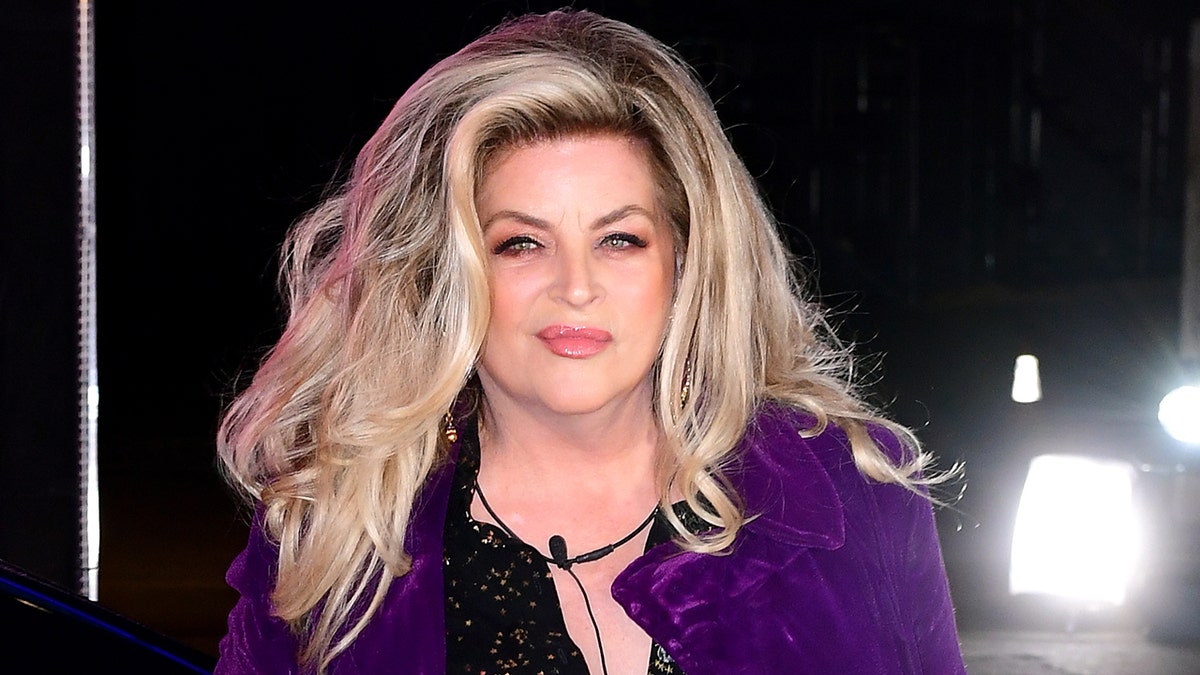 Kirstie Alley purple jacket Church of Scientology