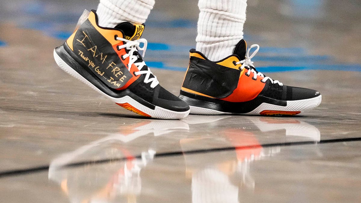 What did Kyrie Irving write on his Nike shoes for first game with