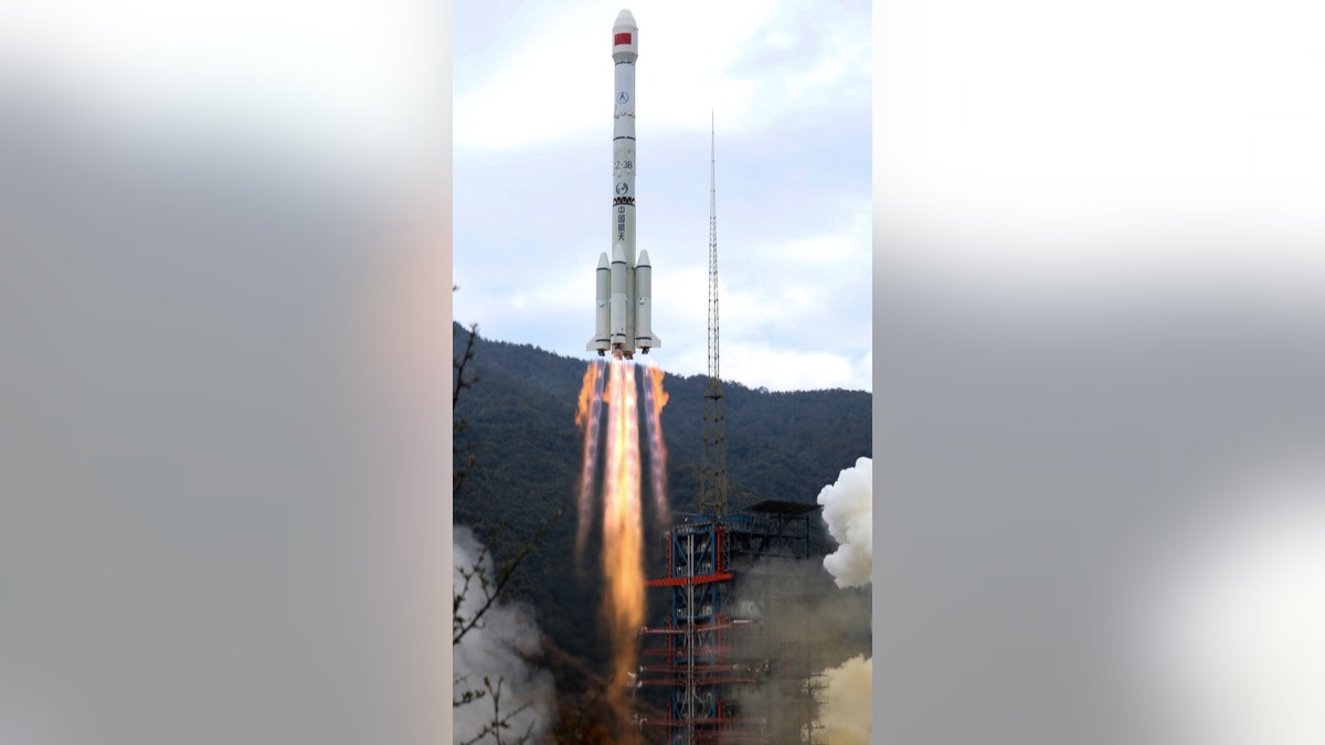 A Chinese rocket is seen blasting off in Xichang, China