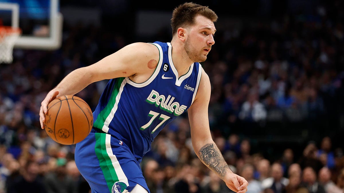 Dallas Mavericks player Luka Doncic dribbles the basketball