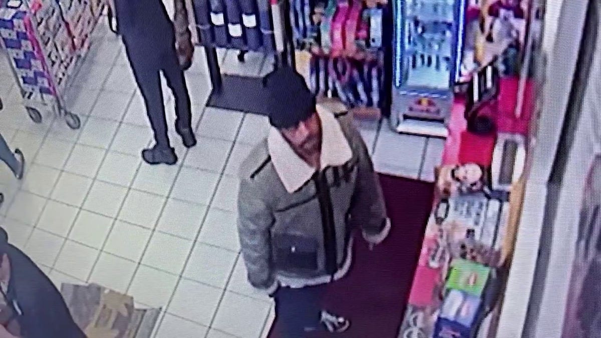 suspect standing in store