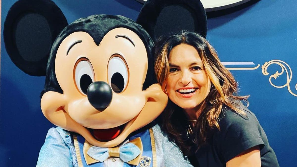 Mariska Hargitay is all smiles while posing with Mickey Mouse at Disney World