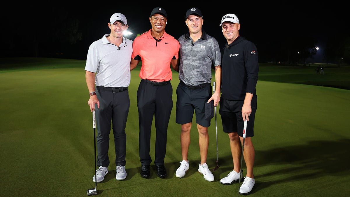 Golfers pose for a picture at The Match 7 at Pelican 