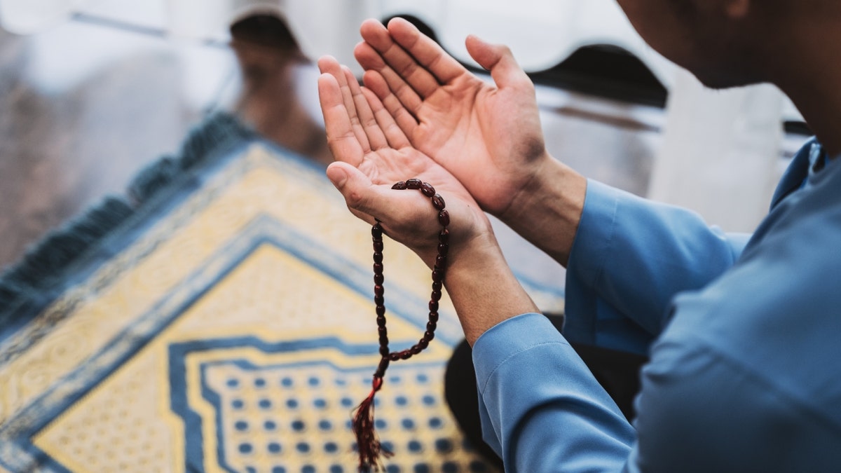 Muslim during daily prayer
