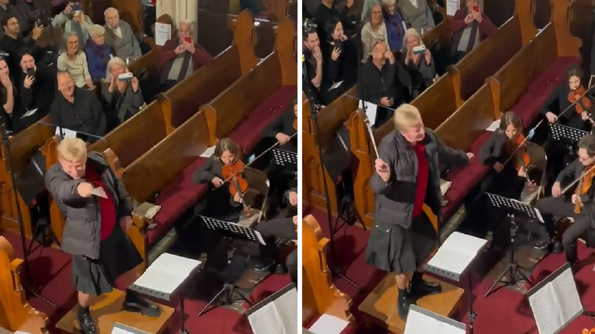 Tim Schultheis conducting an orchestra