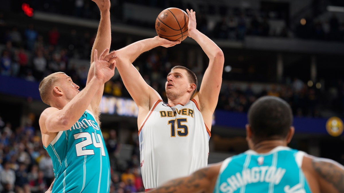 Nikola Jokic takes a shot